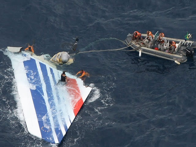 In this June 8, 2009 file photo released by Brazil's Air Force, Brazil's Navy sailors recover debris from the missing Air France Flight 447 in the Atlantic Ocean. / Credit: AP Photo/Brazil's Air Force