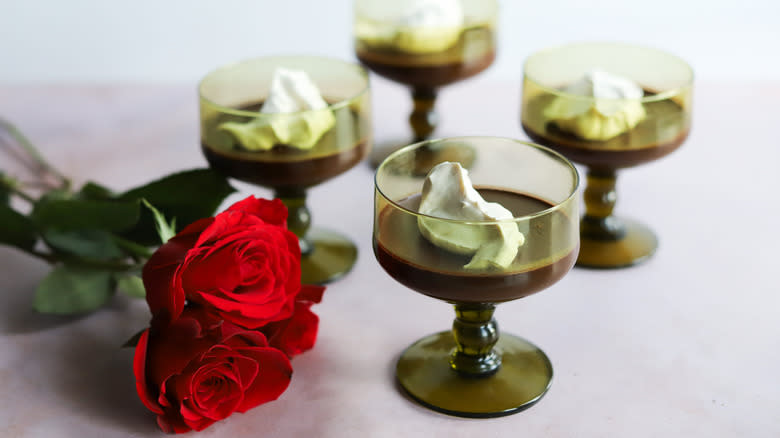 Chocolate pudding in glasses with roses