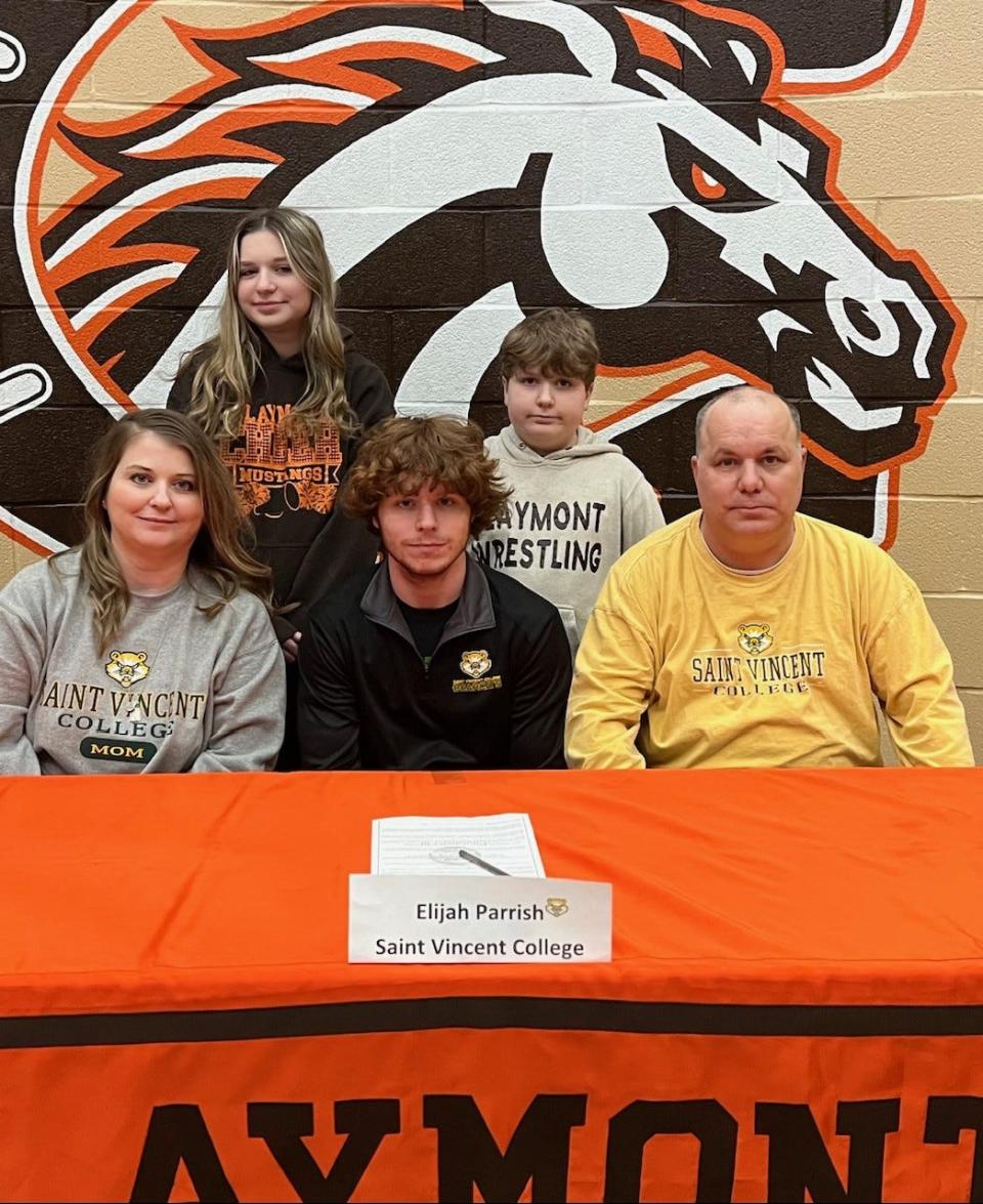 Claymont wrestler Elijah Parrish, front center, will continue his athletic career at Saint Vincent College in Latrobe, Pa. Joining him for a recent ceremony at the school were, seated from left, mother Andrea Parrish and father Mike Parrish, and, standings, sister Melody Parrish and brother Owen Parrish. Elijah Parrish was a state qualifier at 132 pounds in 2022 after placing second in the sectional and fourth in the district. He finished his junior season with a 24-12 record.