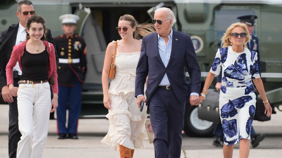 President Biden and first lady Jill Biden, right, arrive on Marine One with granddaughters Natalie Biden, from left, and Finnegan Biden in East Hampton, N.Y. on Saturday -- two days after his disappointing debate performance. - Evan Vucci/AP