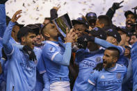 New York City FC celebrates winning the Eastern Conference Championship following an MLS playoff soccer match against the Philadelphia Union, Sunday, Dec. 5, 2021, in Chester, Pa. New York City FC won 2-1 and clinches the MLS Eastern Conference Championship. (AP Photo/Chris Szagola)