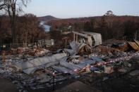 The remnants of a destroyed home, burnt in the recent bushfires, is pictured in Conjola Park