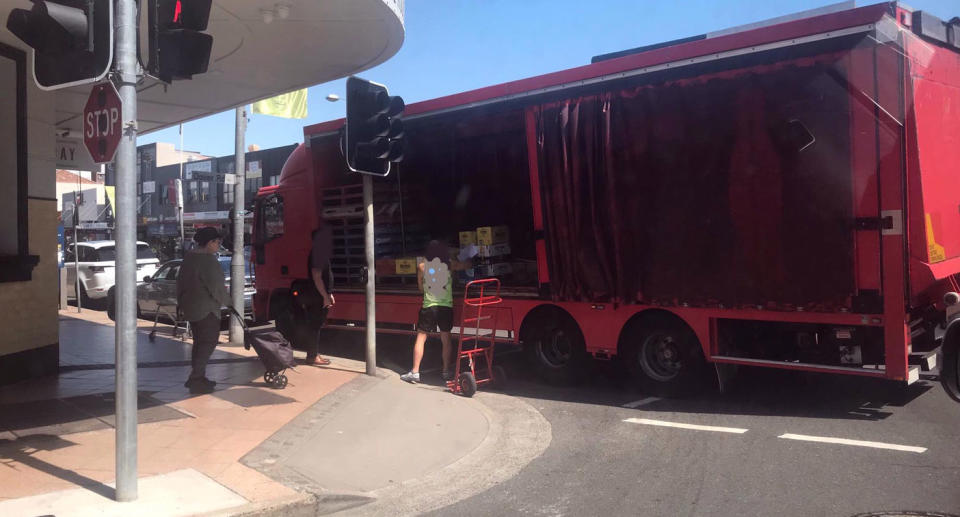 Truck pictured parked outside a pub in Rose Bay, Sydney, with tail blocking an intersection.