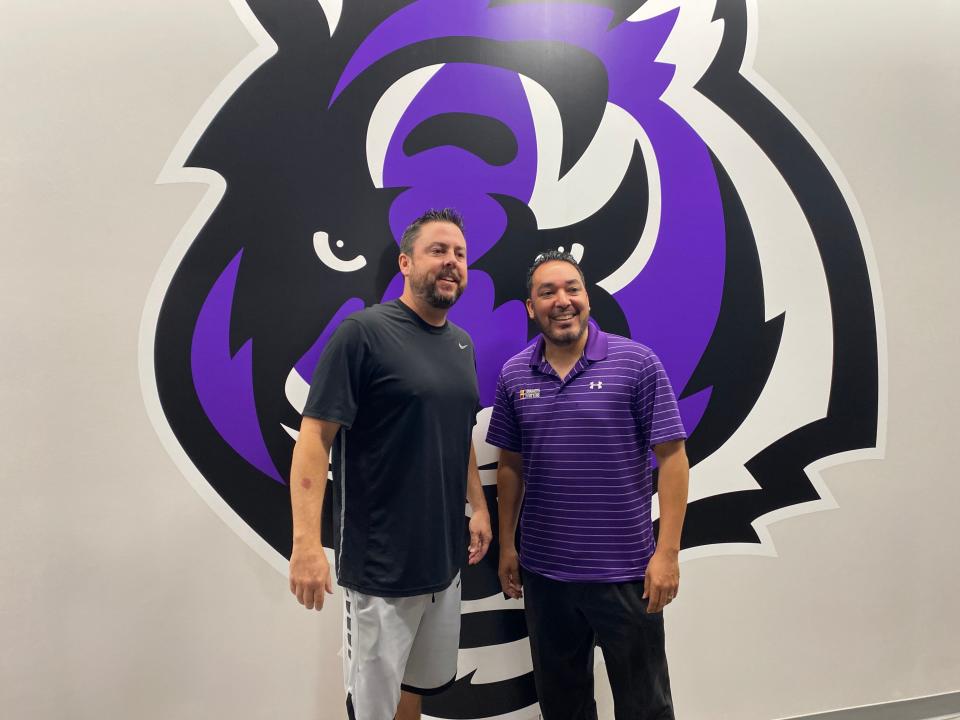 Millennium boys basketball coach Ty Amundsen and Athletic Director Remigio Gordillo give a tour of their new gym.