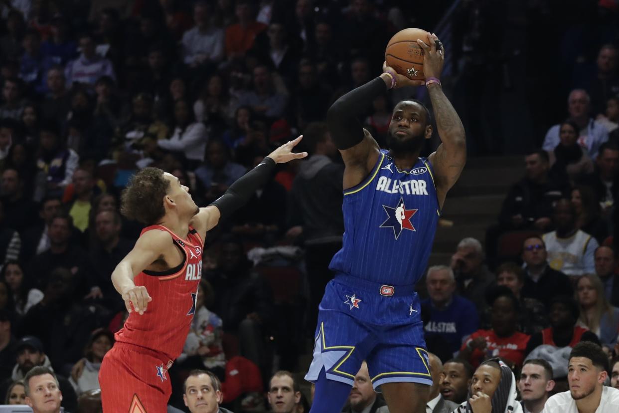 LeBron James shoots over Trae Young during the 2020 NBA All-Star Game in Chicago. (AP Photo/Nam Huh)