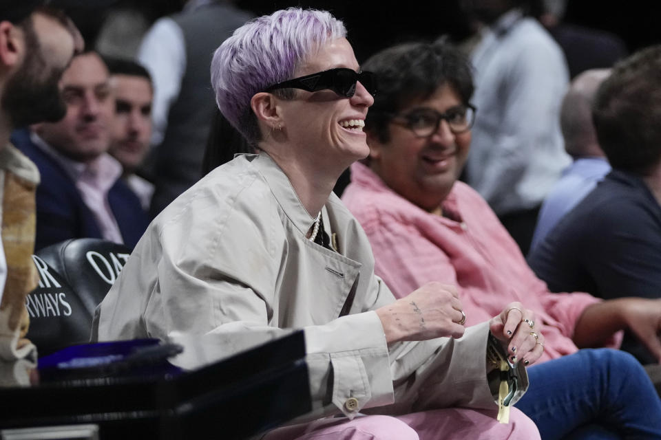 Megan Rapinoe poses during the first half of an NBA basketball game between the Brooklyn Nets and the Houston Rockets, Wednesday, March 29, 2023, in New York. (AP Photo/Frank Franklin II)