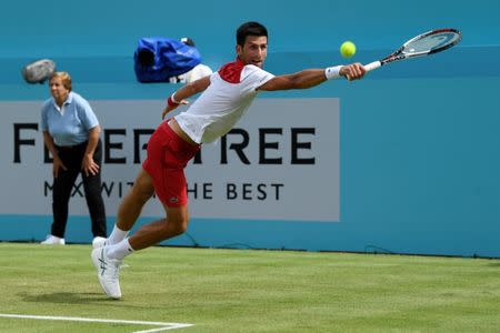FILE PHOTO: Tennis - ATP 500 - Fever-Tree Championships - The Queen's Club, London, Britain - June 19, 2018 Serbia's Novak Djokovic in action during his first round match against Australia's John Millman Action Images via Reuters/Tony O'Brien