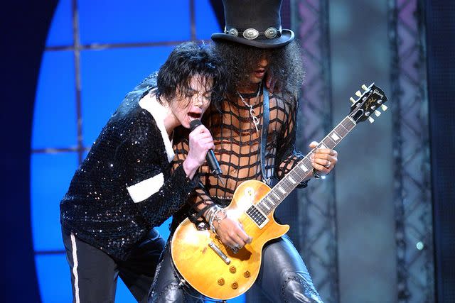 <p>Kevin Mazur/WireImage</p> Michael Jackson and Slash
