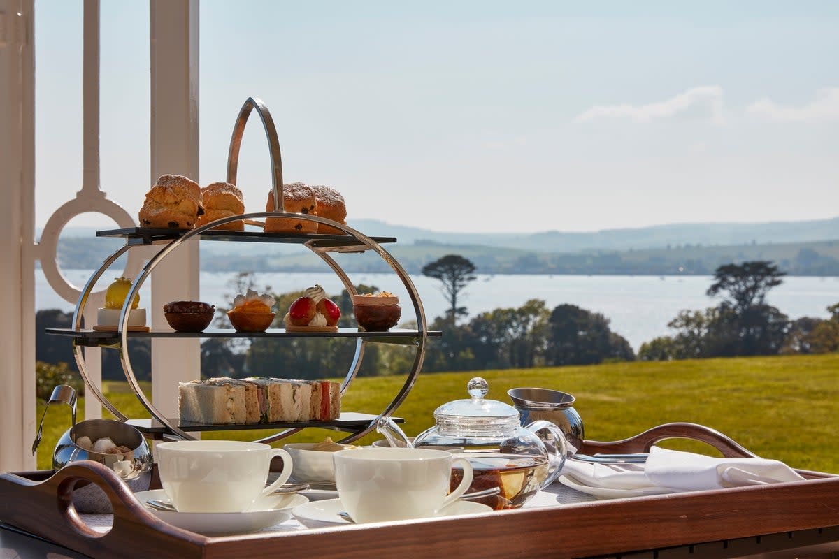 Relax with afternoon tea, served by the manor’s Michelin-star kitchen (Lympstone Manor Hotel)