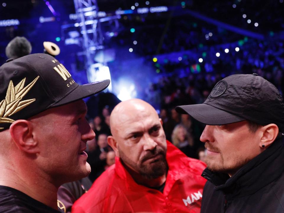 Tyson Fury (left) facing off with Oleksandr Usyk in December (Action Images via Reuters)