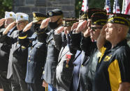 Veterans salute Korean War veteran Army Cpl. Walter Smead, a member of Battery A, 57th Field Artillery Battalion, 7th Infantry Division who was killed during the 1950 Battle of the Chosin Reservoir, is laid to rest with full military honors at Gerald B. H. Solomon Saratoga National Cemetery, on Monday, Sept. 20, 2021, in Schuylerville, N.Y. Korean War veteran Army Cpl. Walter Smead, a member of Battery A, 57th Field Artillery Battalion, 7th Infantry Division who was killed during the 1950 Battle of the Chosin Reservoir, is laid to rest with full military honors at Gerald B. H. Solomon Saratoga National Cemetery, on Monday, Sept. 20, 2021, in Schuylerville, N.Y. Smead was finally laid to rest near his rural upstate New York hometown, seven decades after he was killed in the Korean War and months after his remains were finally identified with help from DNA analysis. (AP Photo/Hans Pennink)