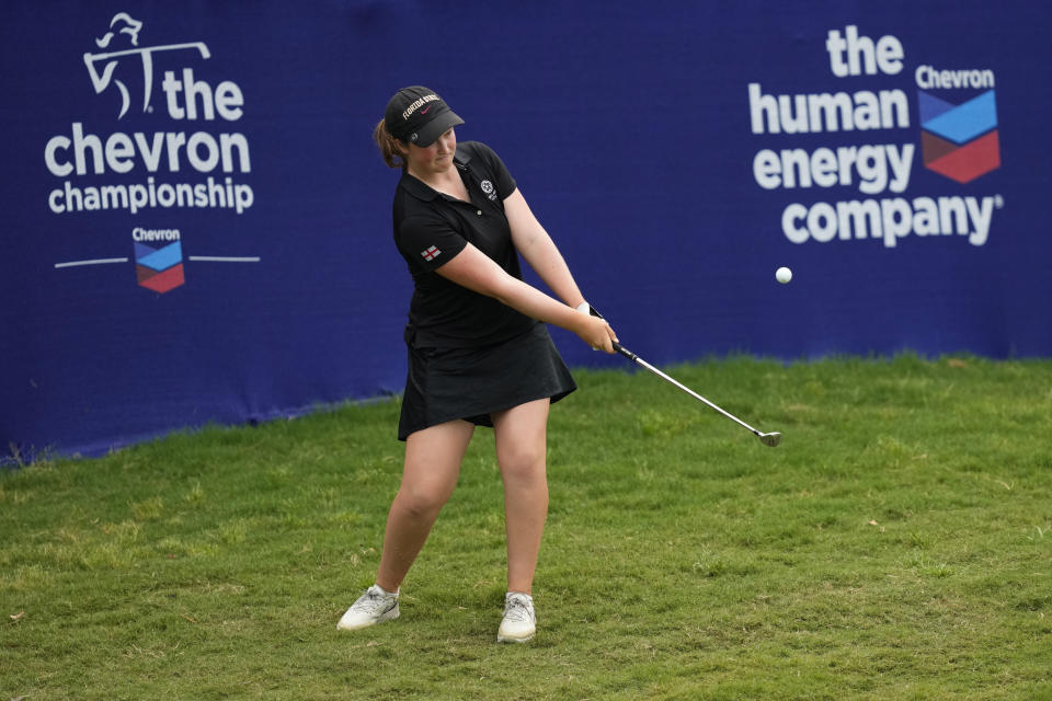 Lottie Woad, of England, chips onto the 18th green during the second round of the Chevron Championship LPGA golf tournament Friday, April 19, 2024, at The Club at Carlton Woods, in The Woodlands, Texas. (AP Photo/David J. Phillip)