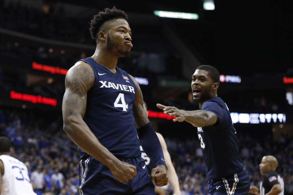 Xavier's Tyrique Jones (4) reacts after scoring against Seton Hall during the first half of an NCAA college basketball game, Saturday, feb. 1, 2020, in Newark, N.J. (AP Photo/Michael Owens)