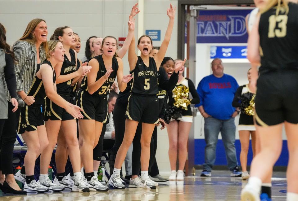 Noblesville Millers players yell from the bench Wednesday, Nov. 29, 2023, during the game at Hamilton Southeastern High School in Fishers. The Hamilton Southeastern Royals defeated the Noblesville Millers, 71-69.