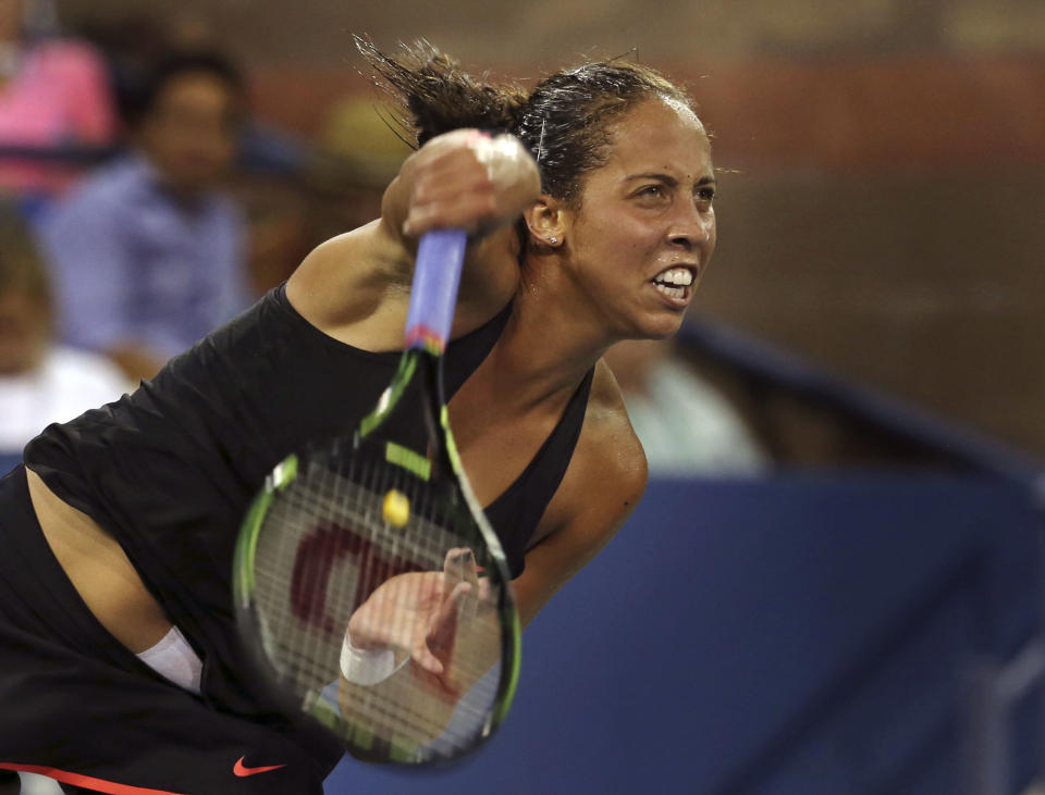 Madison Keys of the United States serves to Agnieszka Radwanska, of Poland, during the third round of the U.S. Open tennis tournament, Friday, Sept. 4, 2015, in New York. (AP Photo/Adam Hunger)