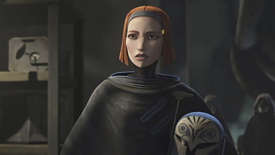 Bo-Katan holds her helmet and wears a cloak on Star Wars Rebels