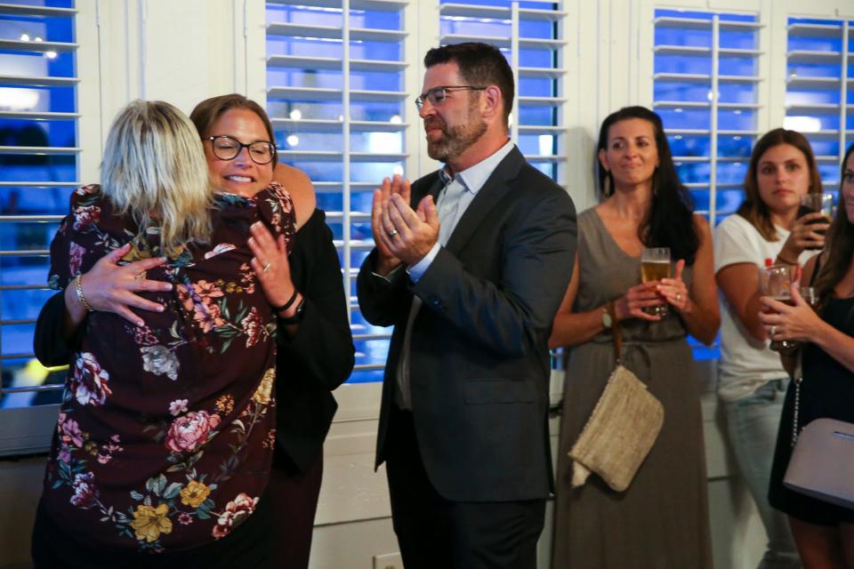 "What a sad day for Martin County," said Karen Resciniti, the president of the Martin County Education Association, who hugs Liz Bernstein after Bernstein lost the Martin County School Board District 3 seat to Jennifer Russell on Tuesday, Aug. 23, 2022, at Pirate's Cove Resort and Marina in Port Salerno. Russell replaces incumbent Victoria Defenthaler. "Education in this county used to be the best and now it's declining. I ran a clean campaign and I'm proud of it and I hope you are too," said Bernstein. "This is my home and I'm not going to stop fighting for it."