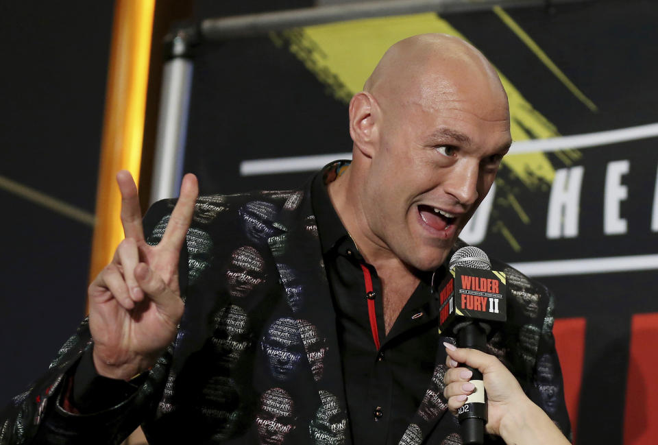 Tyson Fury, of England, who is scheduled to fight Deontay Wilder on Saturday for the WBC heavyweight boxing title, arrives at the MGM Grand on Tuesday, Feb. 18, 2020, in Las Vegas. (AP Photo/Isaac Brekken)