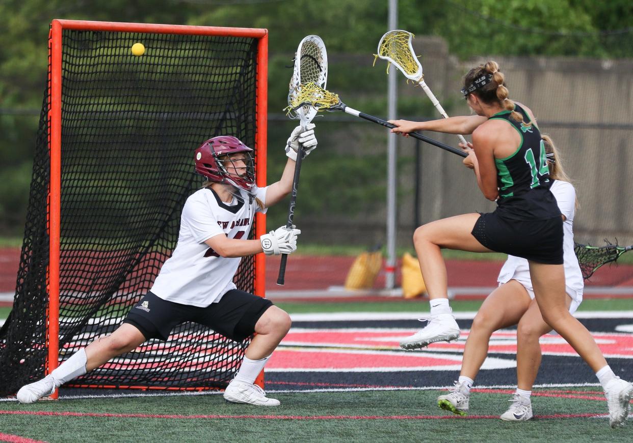 Dublin Coffman’s Kate Tyack scores against New Albany’s Annika Duncan during the 2021 Division I state final. Duncan, who helped the Eagles to this year's state title, said allowing goals doesn't faze her. ”You can’t save every single shot. I started having more fun with it and that was huge,” she said.