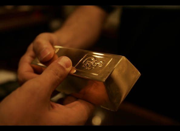 Concerns about an impending economic doomsday are driving the rush to buy up gold, says <a href="http://dealbook.blogs.nytimes.com/2010/06/14/uncertainty-restores-glitter-to-an-old-refuge-gold/" target="_hplink"> the <em>New York Times</em></a>. While the S&P 500 is down 13 percent since 2001, gold is now worth nearly five times what it was then, the paper points out.    