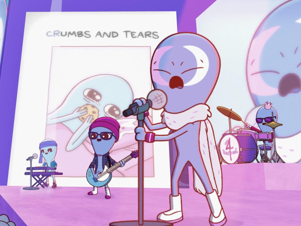a band of beings in strange planet, with one singing in the foreground. an image in the background shows a being crying and eating a cookie in the bed, with the caption "crumbs and tears"