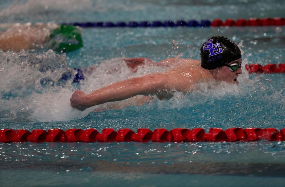 South Eugene's Burke Sherman races to the lead during the boys 200 yard individual medley during the 6A Southwest Conference district meet at Willamalane Pool in Springfield Saturday, Feb. 11, 2023.