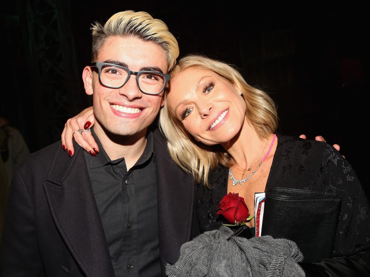Michael Consuelos and Kelly Ripa pose backstage at Jake Shears' Broadway Debut In "Kinky Boots"
