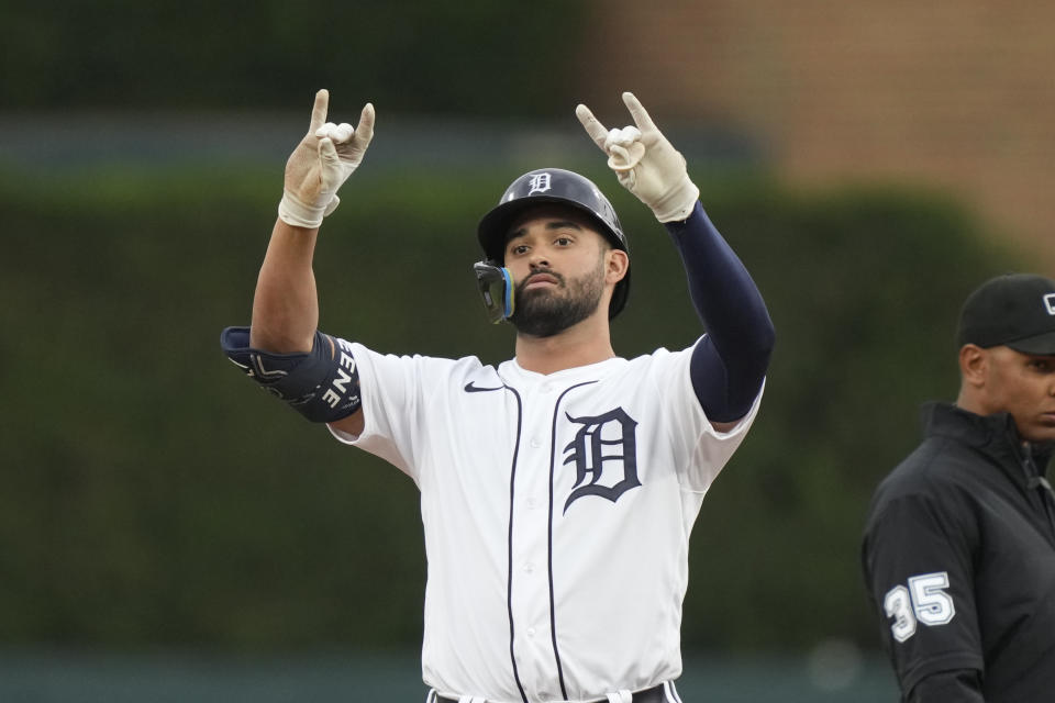 Detroit Tigers' Riley Greene signals to the dugout after his double during the first inning of a baseball game against the Pittsburgh Pirates, Tuesday, May 16, 2023, in Detroit. (AP Photo/Carlos Osorio)