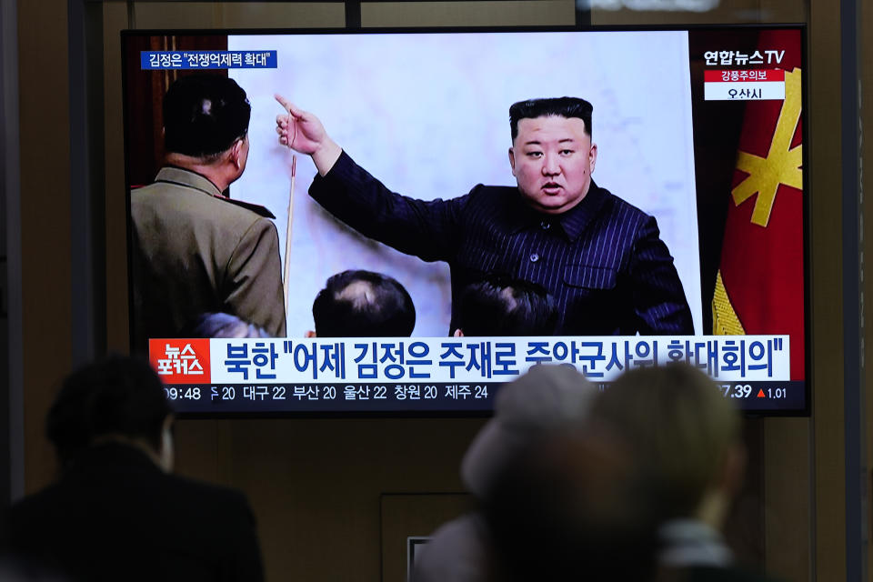 A TV screen shows an image of North Korean leader Kim Jong Un, during a news program at the Seoul Railway Station in Seoul, South Korea, Tuesday, April 11, 2023. Kim vowed to enhance his nuclear arsenal in more "practical and offensive" ways as he met with senior military officials to discuss the country's war preparations in the face of his rivals' "frantic" military exercises, state media said Tuesday. The letters read "North Korea, Kim Jong Un presides the meeting of the Central Military Commission yesterday." (AP Photo/Lee Jin-man)