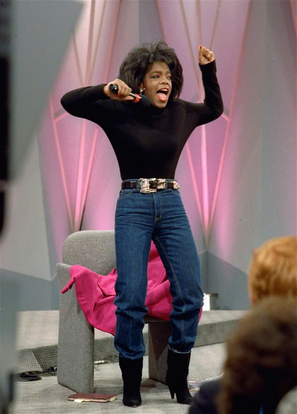 Oprah Winfrey shows off weight loss in the early days of her daytime program, on Nov. 15, 1988.