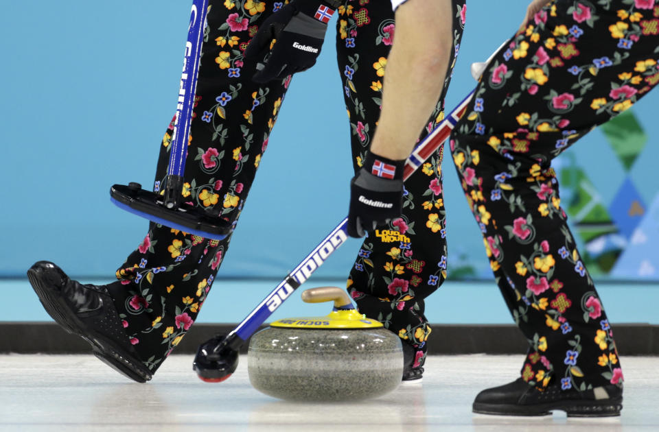 <p>Norway wears pants with a rose painting design during men’s curling competition against Canada at the 2014 Winter Olympics, Friday, Feb. 14, 2014, in Sochi, Russia. (AP Photo/Robert F. Bukaty) </p>