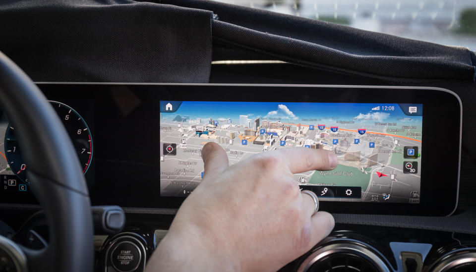 Android Auto and CarPlay are both pretty great. You plug your smartphone into