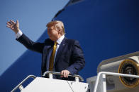 President Donald Trump waves as he arrives at Moffett Federal Airfield to attend a fundraiser, Tuesday, Sept. 17, 2019, in Mountain View, Calif. (AP Photo/Evan Vucci)