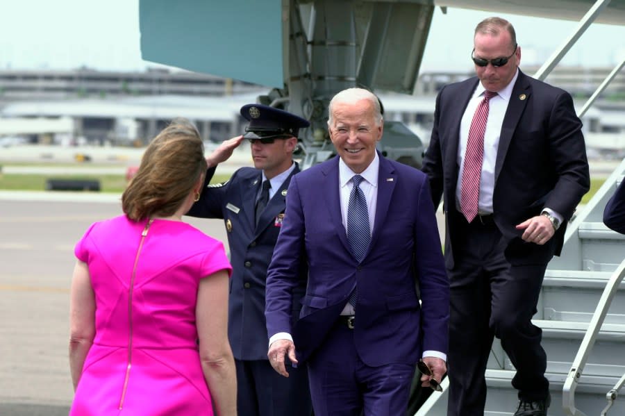 <em>President Joe Biden greets Rep. Kathy Castor, D-Fla., as he arrives at Tampa International Airport, in Tampa, Fla., Tuesday, April 23, 2024. (AP Photo/Manuel Balce Ceneta)</em>