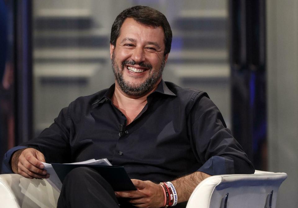 Italian Deputy Premier and Interior Minister, Matteo Salvini, smiles as he attends a RAI state TV program in Rome, Wednesday, June 26, 2019. A German humanitarian ship carrying 42 migrants rescued off Libya two weeks ago is in Italian waters within sight of Lampedusa island in defiance of a ban by the country's hard-line interior minister. Interior Minister Matteo Salvini said he wouldn't allow any of the migrants to disembark and threatened Wednesday to deploy law enforcement. (Riccardo Antimiani/ANSA via AP)