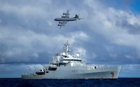 Survey ship HMS Echo and a Lockheed P-3 Orion during the early days of the search in the southern Indian Ocean - Credit: Press Association
