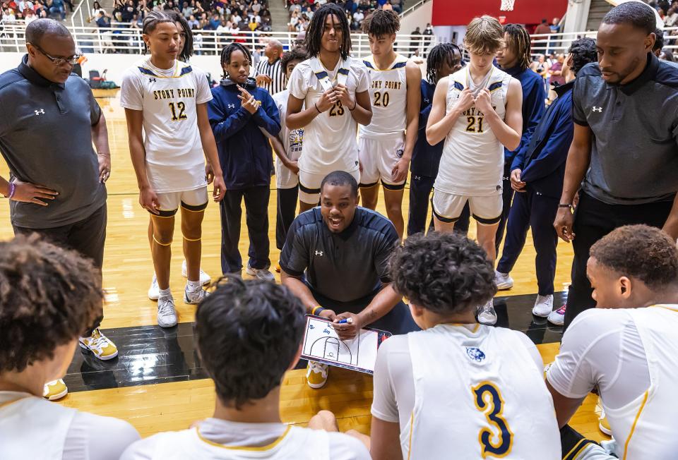 Stony Point coach Antoine Thompson talks to his team before the fourth period of the Cavaliers' Class 6A regional quarterfinal playoff win over district rival Westlake at the Burger Center. Thompson led the Tigers all the way to the Class 6A state championship game.