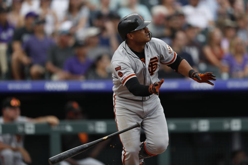 San Francisco Giants shortstop Donovan Solano (7) in the third inning of a baseball game Sunday, Aug. 4, 2019, in Denver. (AP Photo/David Zalubowski)