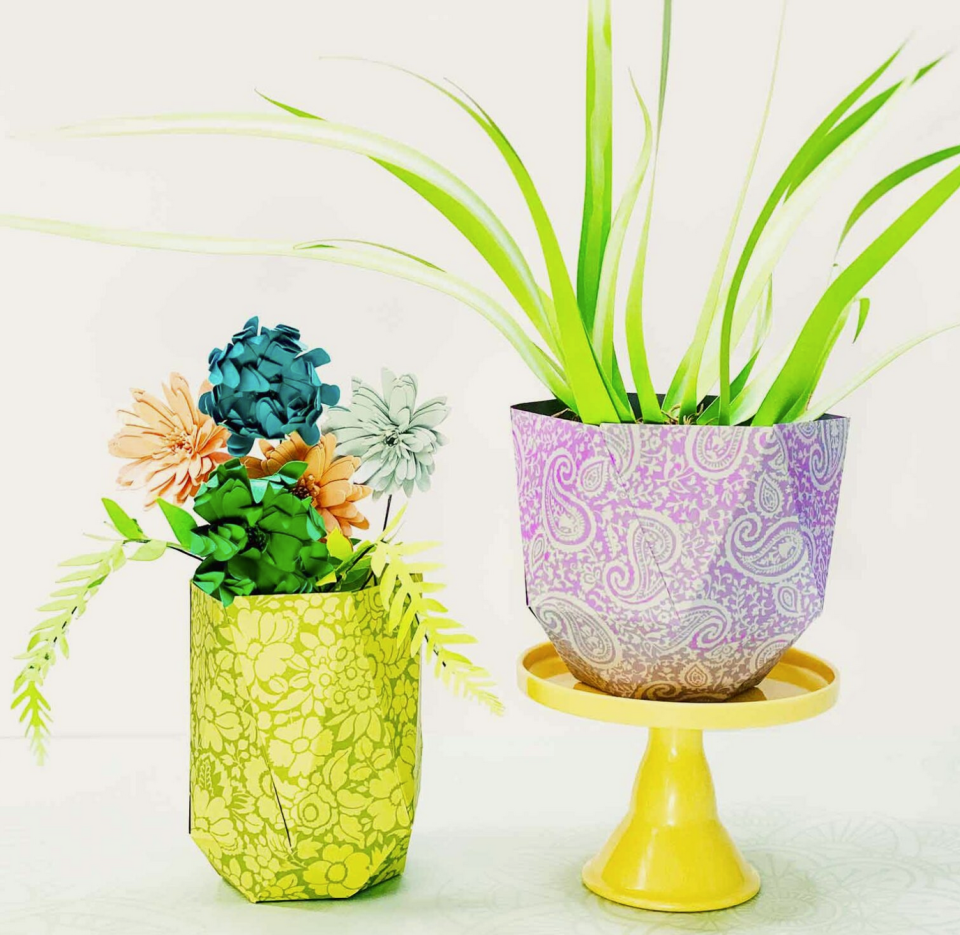 Stick-on wallpaper: Refresh a vase with floral print stick on paper; two vases with paper on them