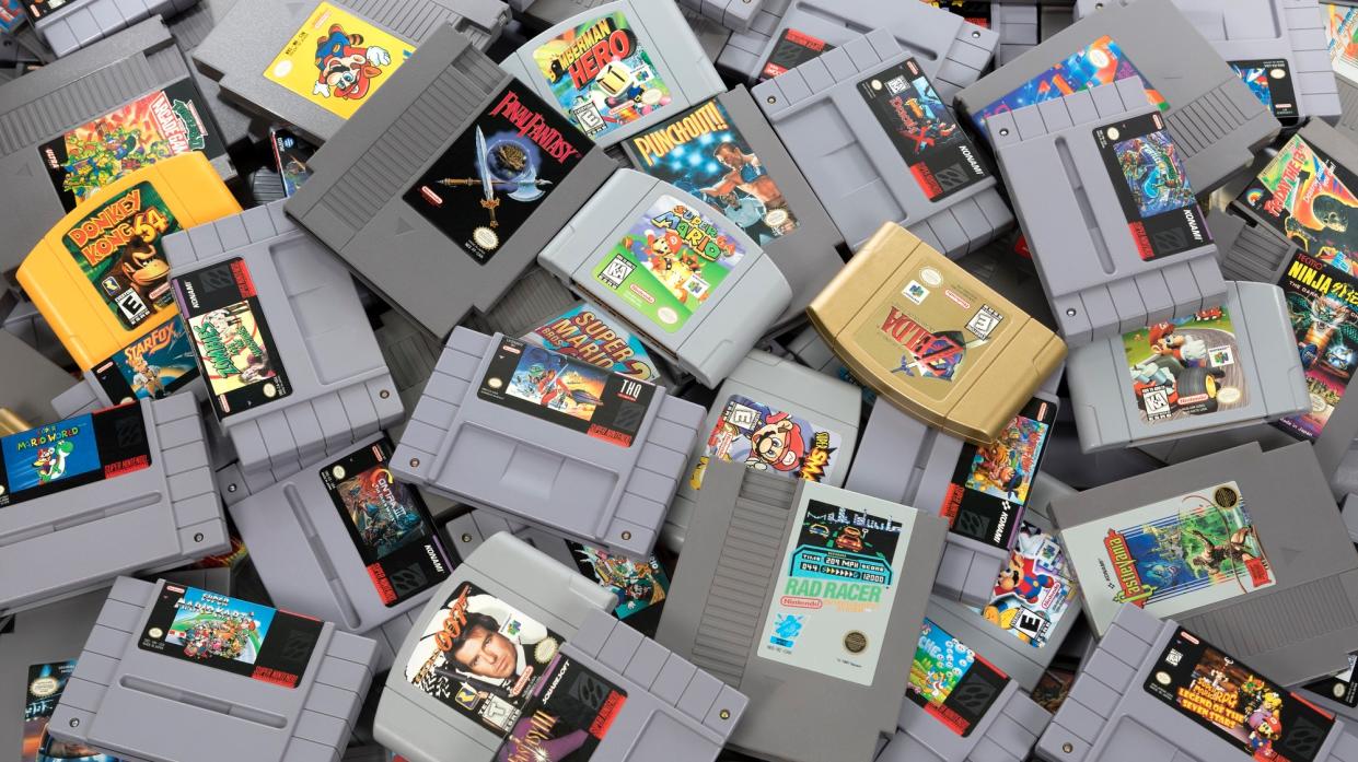 A studio shot of a heap of Nintendo games shot from above.