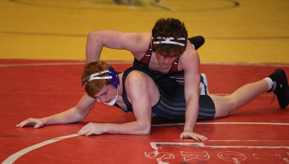 Sam Szerlip from Nyack wrestles Clarence W. Smith from New Rochelle in the 160 pound match, during the first day of the Section One Division I championships at the Westchester County Center in White Plains, Feb. 10, 2024.