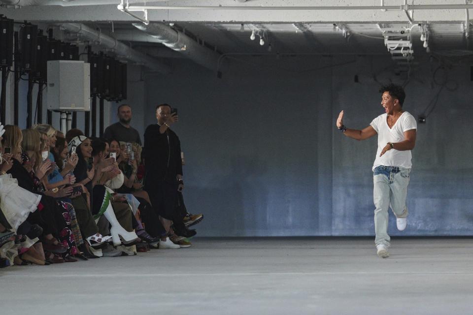 Fashion designer Prabal Gurung appears on the runway after showing his Spring Summer 2023 collection during Fashion Week, Saturday Sept. 10, 2022 in New York. (AP Photo/Bebeto Matthews)