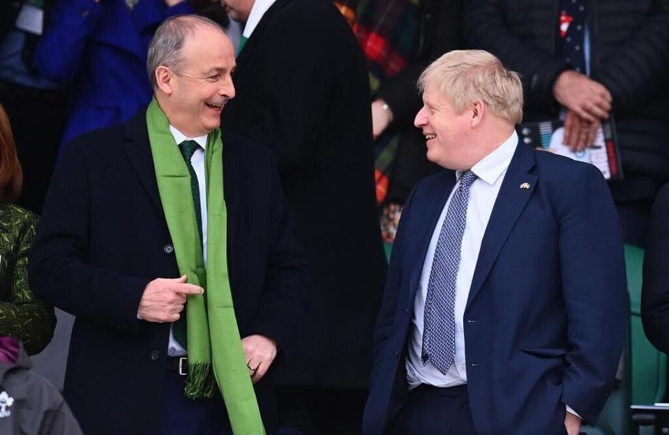 Taoiseach Micheal Martin with Prime Minister Boris Johnson in the stands ahead of a Six Nations match (Irish Government/PA) (PA Media)