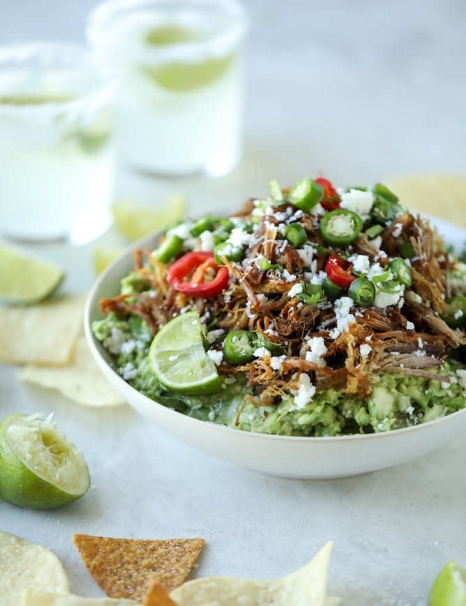 <strong>Get the <a href="https://www.howsweeteats.com/2017/12/pulled-pork-guacamole/" target="_blank">Crispy Carnitas Guacamole</a> recipe from How Sweet Eats</strong>