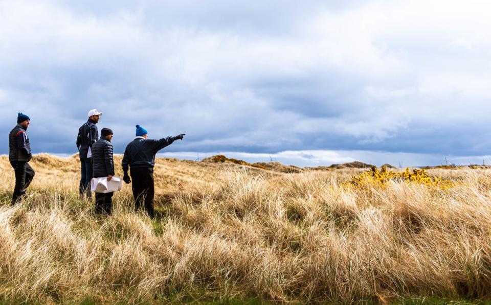 Donald Trump with son Eric at his Menie golf resort in Aberdeenshire on Monday (PA)