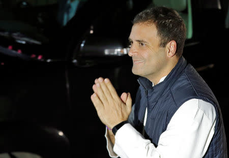 Rahul Gandhi, President of India's main opposition Congress party, greets his supporters as he arrives to attend a news conference at his party's headquarters in New Delhi, India, December 11, 2018. REUTERS/Adnan Abidi