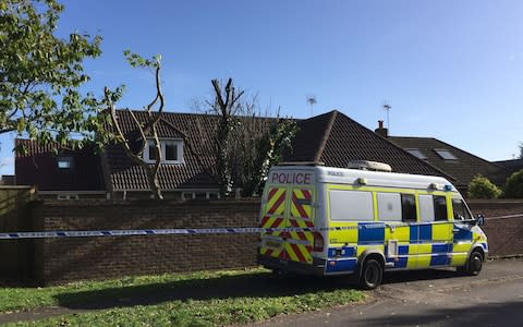 Police outside the family's home in Fordingbridge, Hants, in October 2017 - Credit: Ben Mitchell/PA