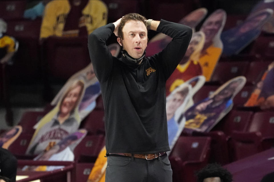 Minnesota head coach Richard Pitino watches his team play against Rutgers in the first half of an NCAA college basketball game, Saturday, March 6, 2021, in Minneapolis. Rutgers won 77-70 in overtime. (AP Photo/Jim Mone)
