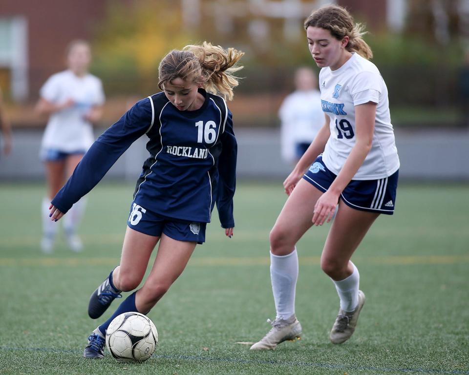 Rockland's Emilee Dunham goes on the attack while Seekonk's Alyssa Clegg tries to catch up in the second half of the preliminary round of the Division 3 state championship at Abington High on Thursday, Nov. 4, 2021. 