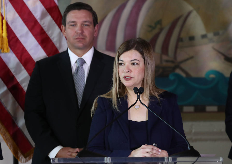 Newly sworn-in Governor Ron DeSantis stands behind Barbara Lagoa as she speaks after he named her to the Florida Supreme Court on January 9, 2019 in Miami, Florida.  / Credit: Joe Raedle / Getty Images